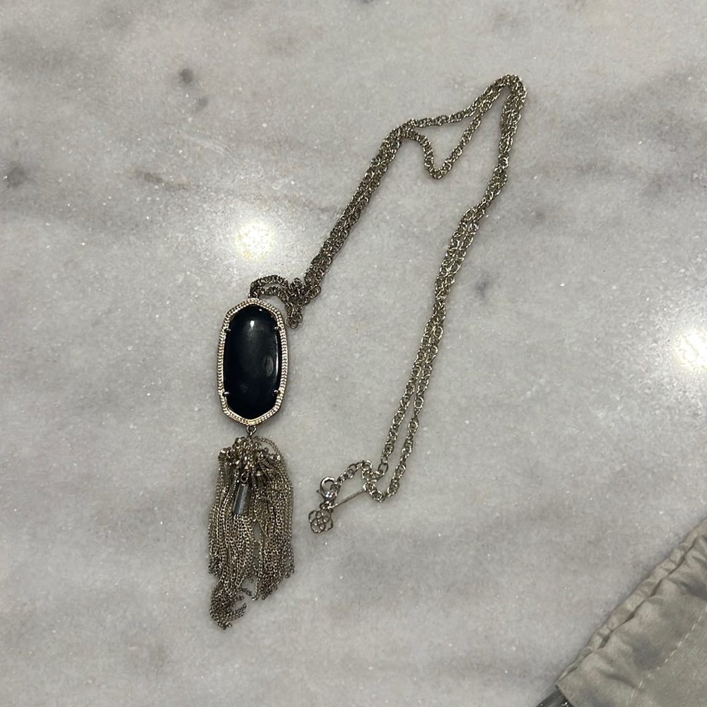 Kendra Scott black and gold pendant necklace with tassel
